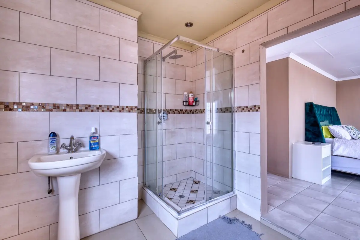Crisp Glass Shower — Minimal · Bright bathroom in Zilker, Austin