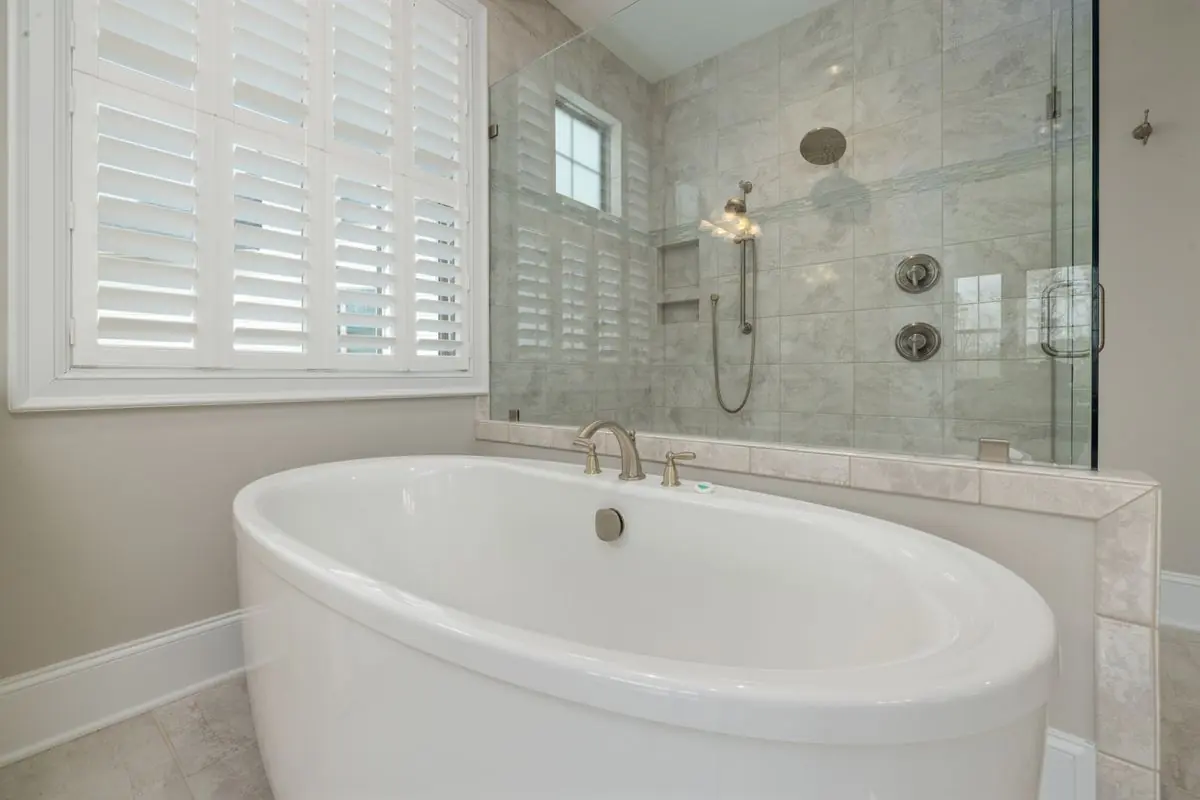 Soaking Suite — Contemporary · Freestanding bathroom in Hyde Park, Austin