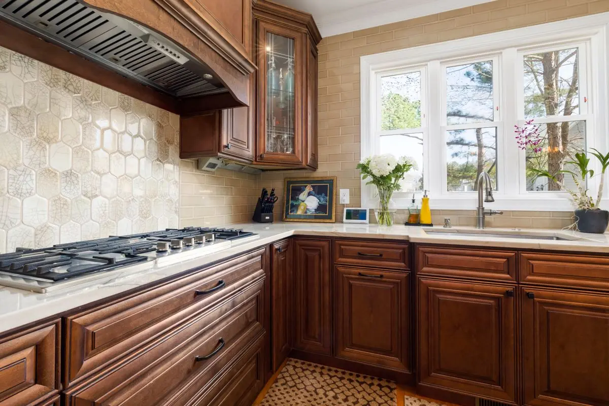 Farmhouse Revival — Farmhouse · Warm Wood kitchen in Dripping Springs