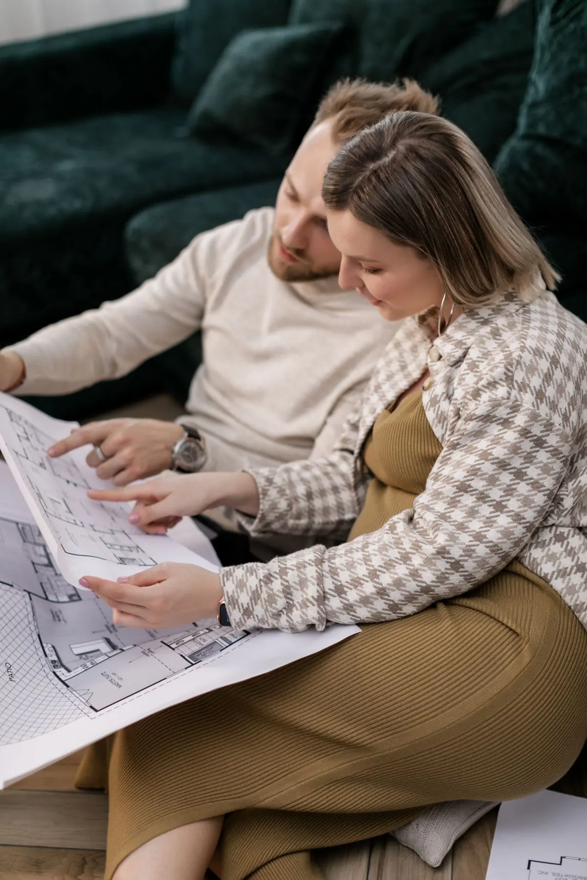 Homeowners reviewing a remodel plan together